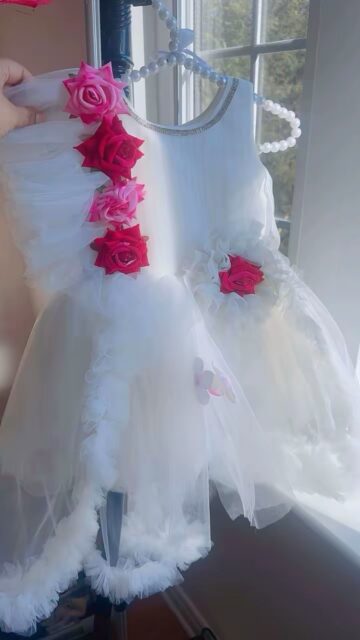 Let your little princess shine in this gorgeous white floral party dress! 🌸✨
Perfect for birthdays, weddings, photoshoots, and special celebrations, this dress combines elegance with comfort so your child can look stylish and feel great.

🌸 Elegant white layered tulle design
🌸 Beautiful 3D rose flower detailing
🌸 Sparkling neckline for a classy touch
🌸 Perfect for parties and special events

📏 Sizes Available: 6 months to 6 years

💖 A must-have dress to make every moment extra special!
Limited pieces available – grab yours before it sells out! ✨#unbeatableprices✔️ #littlefashionista #shippingworldwide✈️🌎 #thelittlewardrobe #kidsfashion